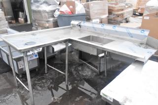 Alt text: "Eagle Group 72-inch stainless steel L-shape dishtable, 16 gauge, brand new scratch and dent condition, with visible manufacturer labels."