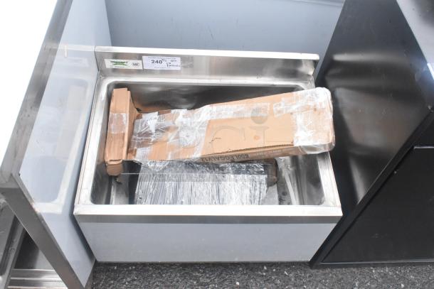 BRAND NEW SCRATCH AND DENT Regency 600IB1824CP underbar ice bin, 18" x 24", 7 circuit cold plate, 51 lb. capacity, visible packaging.