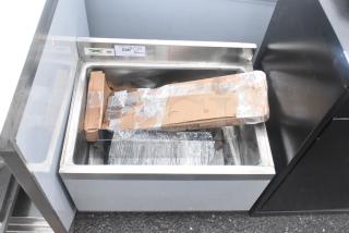 BRAND NEW SCRATCH AND DENT Regency 600IB1824CP underbar ice bin, 18" x 24", 7 circuit cold plate, 51 lb. capacity, visible packaging.