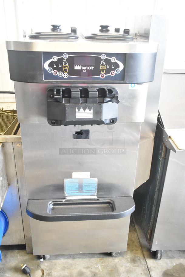 Taylor C723-27 stainless steel 2-flavor soft serve ice cream machine, air-cooled, 208-230V, 1 phase. Excellent condition.