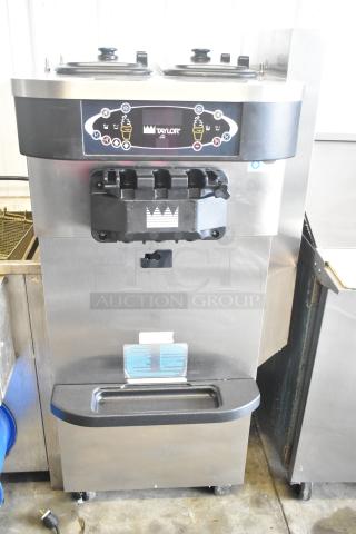 Taylor C723-27 stainless steel 2-flavor soft serve ice cream machine, air-cooled, 208-230V, 1 phase. Excellent condition.