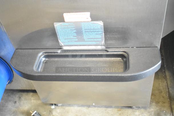 Taylor C723-27 stainless steel countertop soft serve machine, air-cooled, 2 flavors with twist, 208-230V, 1 phase.