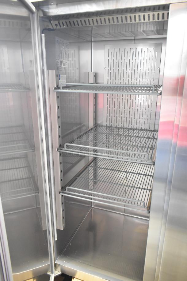 "Brand new Avantco 178Z2FHC commercial 2-door reach-in freezer, scratch and dent, 115 volts, 1 phase, chrome shelving."