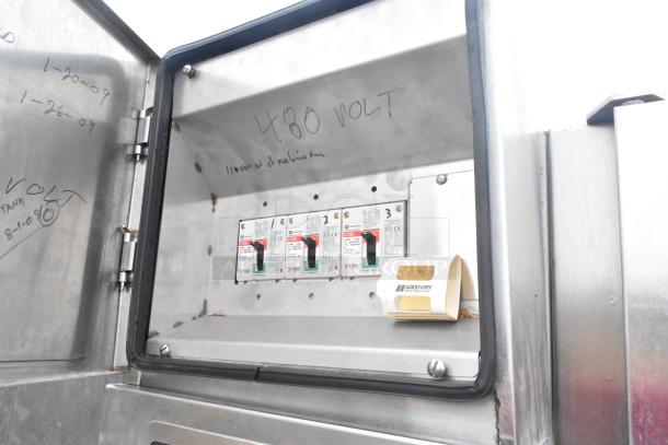 Hobart FT900 dishwasher control panel showing circuit breakers and 480-volt labeling.