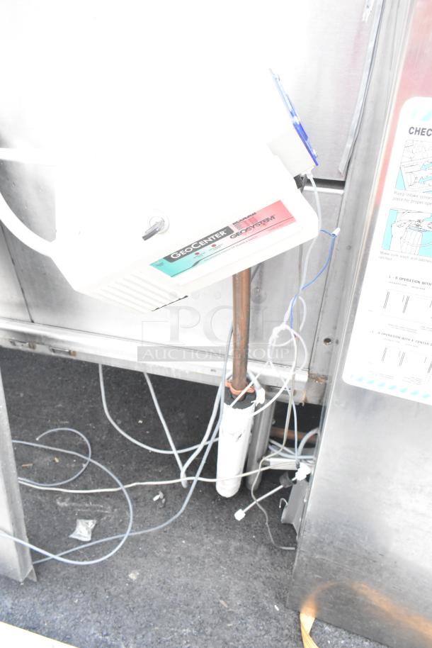 Hobart FT900 commercial dishwasher in stainless steel, showing wiring and control unit. Model FT900, 480V, 3 phase.