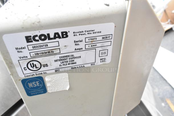 Hobart FT900 commercial flight style dishwasher with Ecolab detergent dispenser label. Model FT900, 480V, 3 phase.