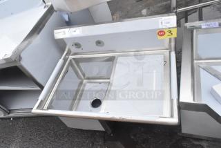 Regency 600S1162018R single bay sink, right side drain board, no legs, scratch and dent condition, labels visible.