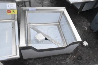 Regency 600SM242412N stainless steel mop sink, brand new, 16-gauge, notched front, 24"x24"x12" bowl, marked for auction.