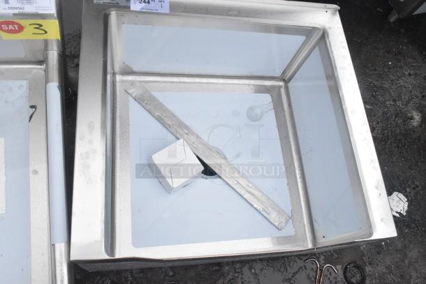 Brand new Regency 600SM242412N 16-gauge stainless steel mop sink, notched front, 24"x24"x12" bowl, slight scratches.