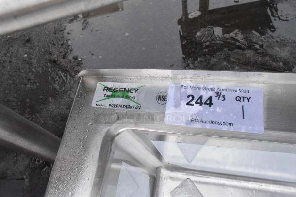 Brand new Regency 600SM242412N stainless steel mop sink, 24"x24"x12" notched bowl, scratch and dent condition, NSF label.