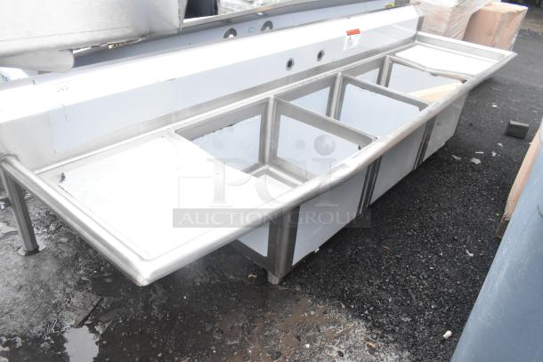 Brand new Advance Tabco FE-3-1812-18RL stainless steel sink, 90", three compartments, two drainboards, minor scratches.