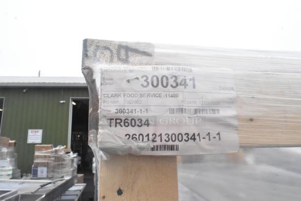 Brand new Federal Industries ITR6034 60" refrigerated bakery display case with scratch and dent condition, labeled for Clark Food Service.