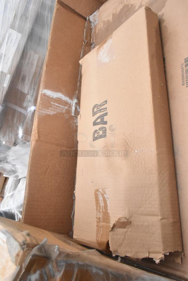 Cardboard box marked "BAR," showing signs of damage, part of 14 new scratch and dent items including trash cans and sink.