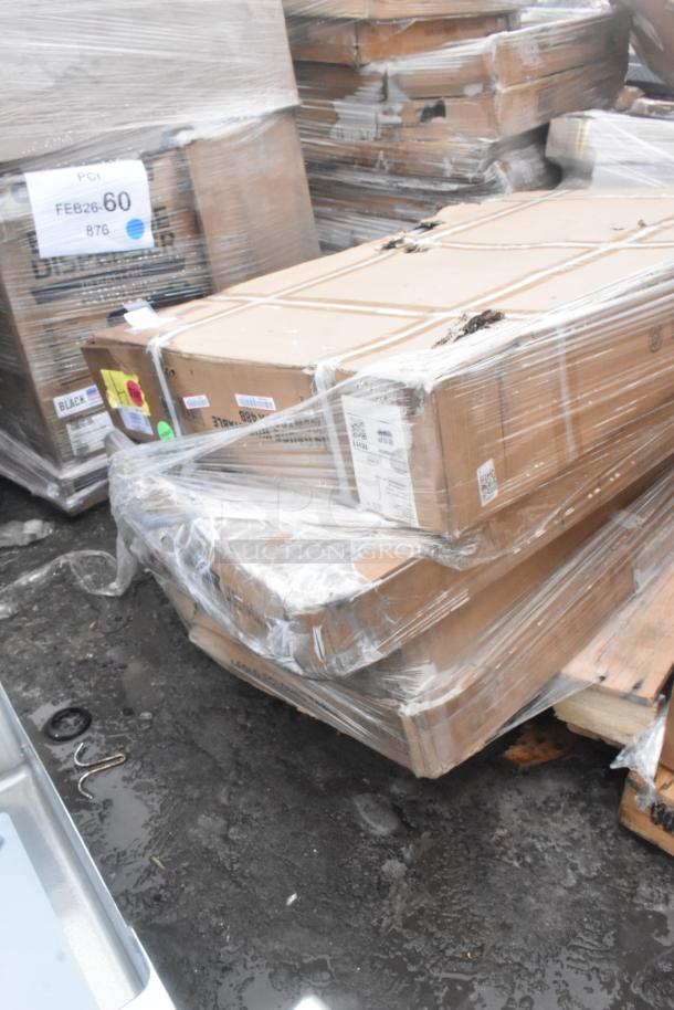 Four boxed, scratch and dent items: work table and bi-fold tables, wrapped in clear plastic. Various labels and tags visible.