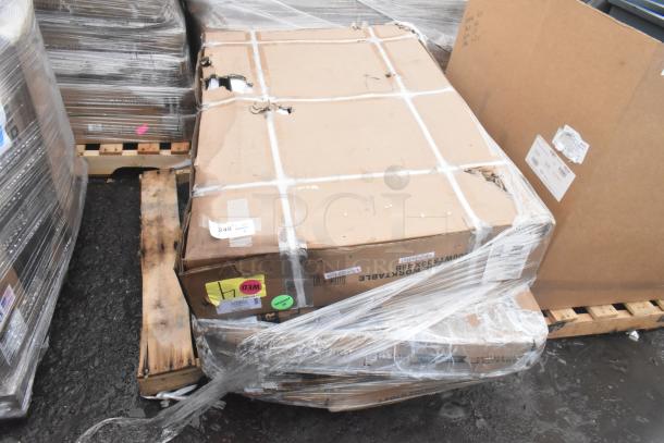 Pallet of scratch and dent items including work table and bi-fold tables in original, slightly damaged packaging, for auction.