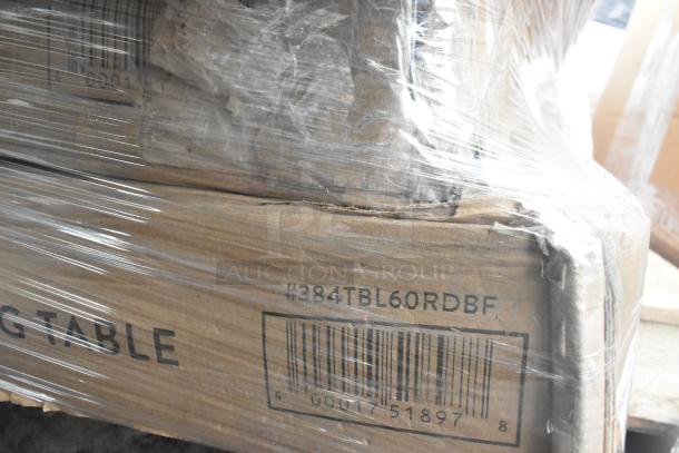 Cardboard boxes with labels "#384TBL60RDBF" indicating scratch and dent items, wrapped in plastic for auction.
