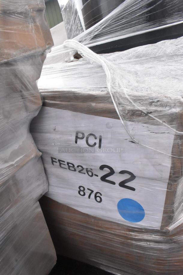 Pallet with wrapped "14 Scratch and Dent" items, includes outdoor tables. Label shows "PCI, FEB26-22, 876" with a blue dot.