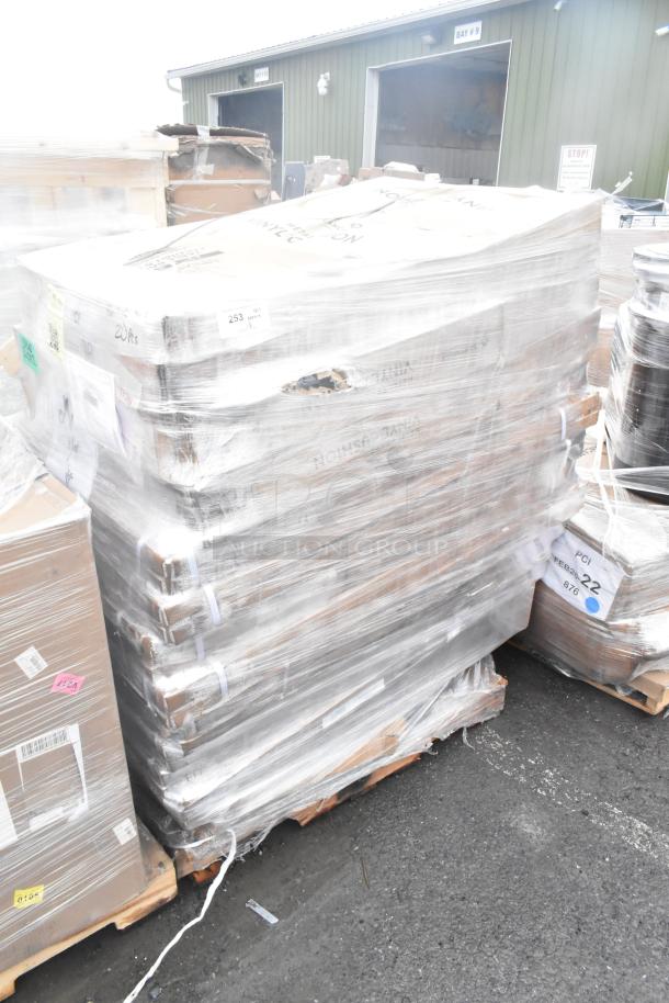 Pallets of 18 new scratch and dent items, including table base columns, wrapped in plastic for auction.