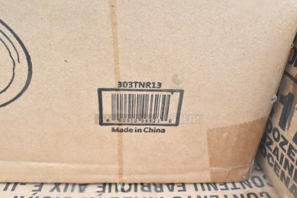 Cardboard box with barcode 0010066230, labeled "Made in China," containing scratch and dent plates, glassware, ramekins.