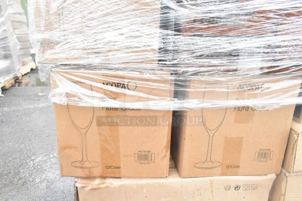 Pallet with sealed boxes of Acopa brand flute glasses, labeled as 12 per case, new condition.