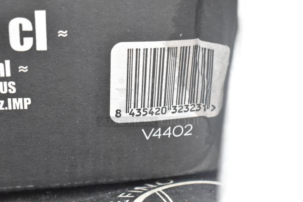 Barcode and label on black packaging with text V4402, indicating 40 new scratch and dent items including plates and glassware.