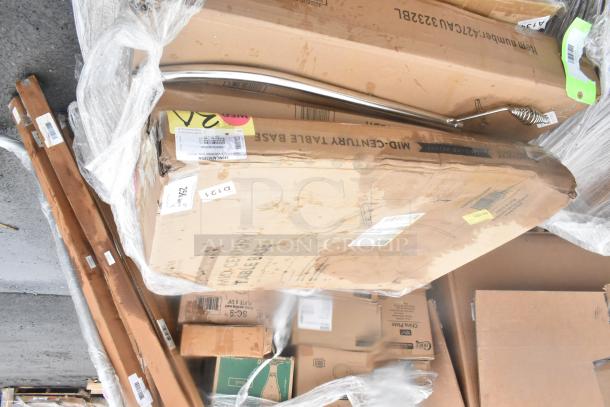 19 new scratch and dent items including wall corner guards, outdoor tables, shelf. Visible labels show item numbers and codes.