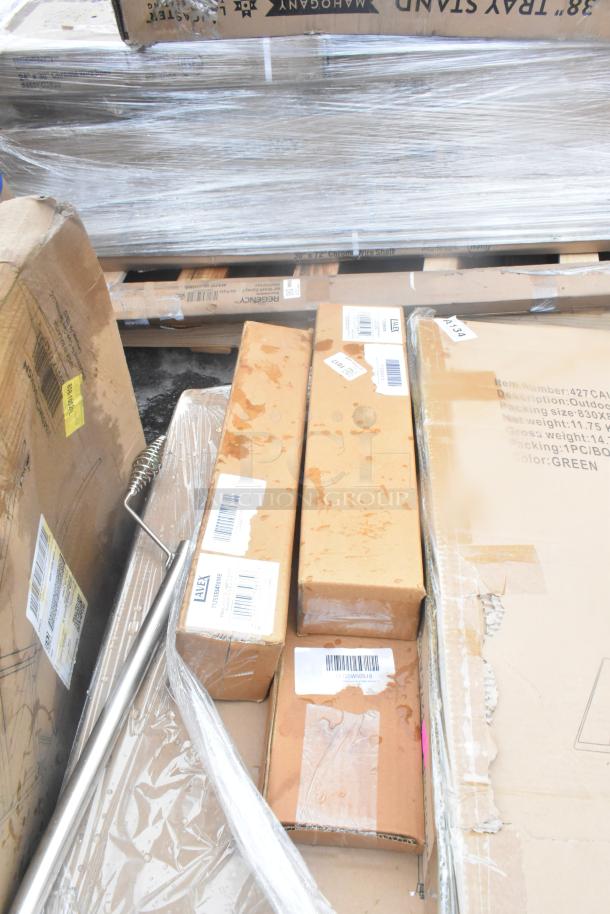 Boxes labeled with barcodes containing scratch and dent items, including wall corner guards, outdoor tables, and shelf.