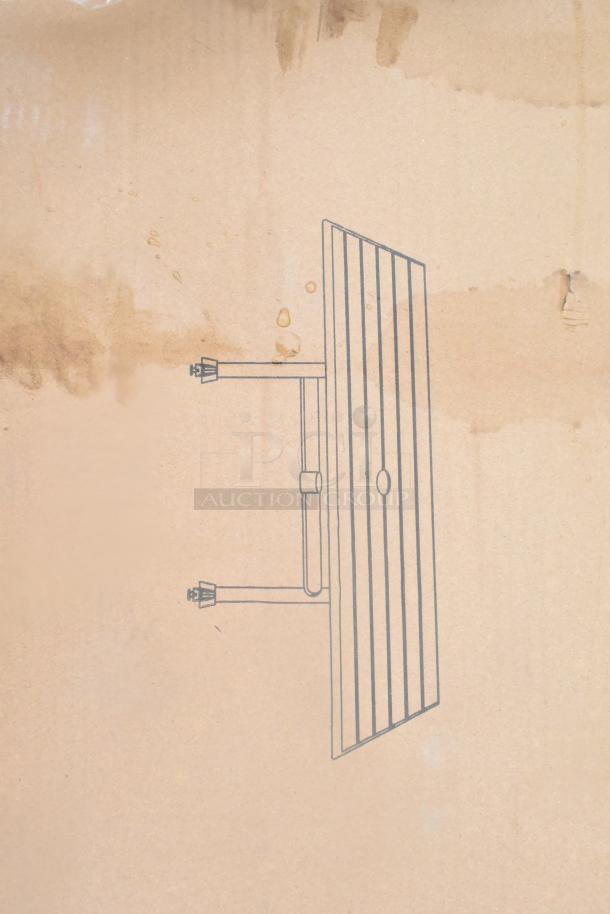 Cardboard with schematic of outdoor table and wall corner guards, indicating brand new and scratch-and-dent items in auction lot.