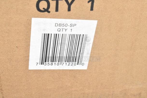 Brown cardboard box with a label showing barcode and text "DB50-SP QTY 1." Auction item includes mixed new scratch and dent items.
