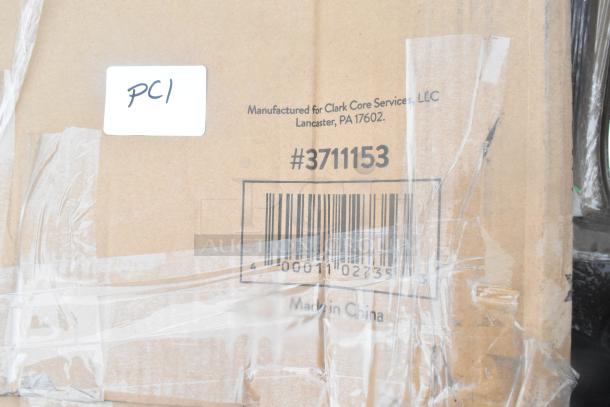 Cardboard box labeled with "Manufactured for Clark Core Services, LLC," barcode, and "Made in China" text, wrapped in plastic.