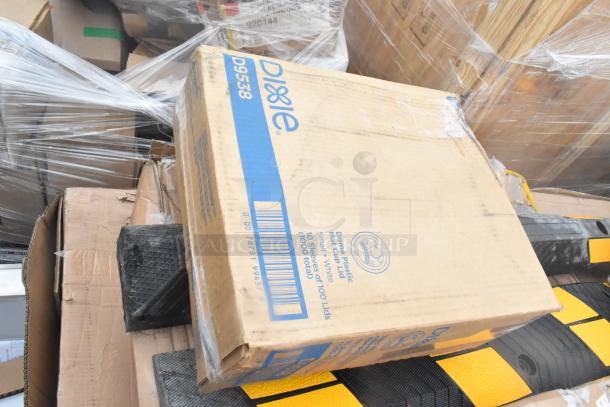 Cardboard box of plastic dome lids, part of 24 new scratch and dent items including corner guard, table, tray stand.