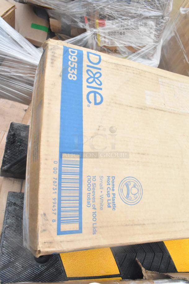 Box labeled Dixie D9538, containing dome plastic hot cup lids. Includes 10 sleeves of 100 lids each, totaling 1000 lids.