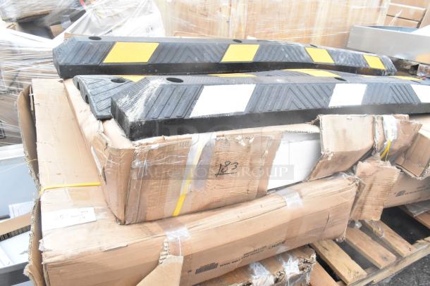 24 brand new scratch and dent items, including wall corner guard and work table. Visible box wear; item tags with "183" marking.