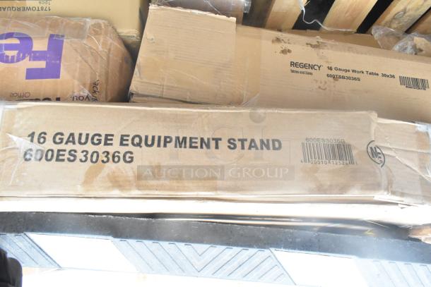 Boxes of new, scratch and dent items including Regency 16 gauge work table and equipment stand. Marked 600ES3036G.