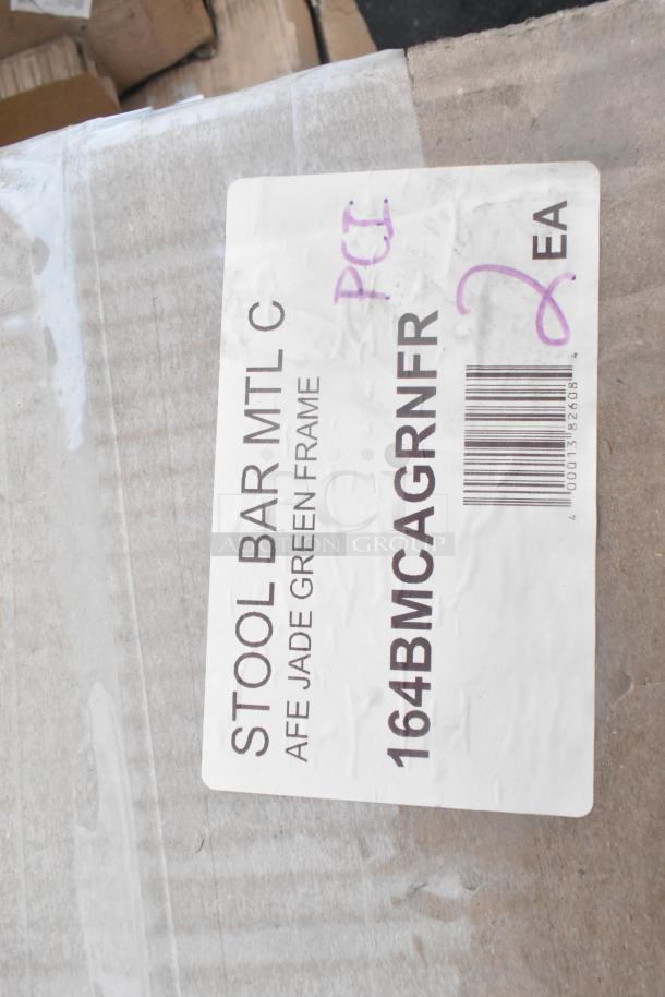 Label on box showing "164BMCAGRNFR Lancaster Table & Seating Metal Green Cafe Bar Stool Frame," marked "PCL, 2 EA."