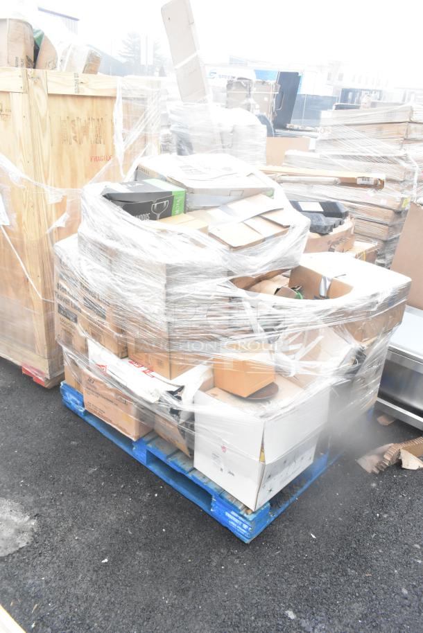 Plastic-wrapped pallet of assorted boxes labeled for glassware and dishes, marked as 34 brand new scratch and dent items.
