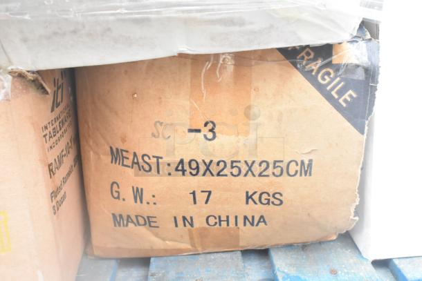 Cardboard box labeled "MADE IN CHINA," dimensions 49x25x25 cm, weight 17 kg, containing scratch and dent glassware and dishes.