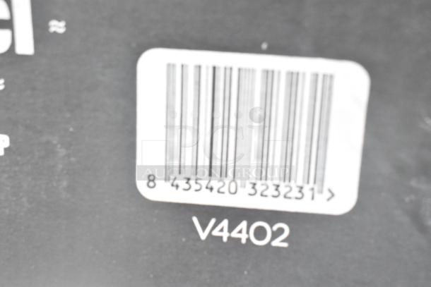 Barcode and code "V4402" on box of 34 brand new scratch and dent items, including glassware and dishes.