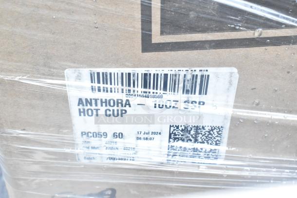 Label on cardboard box reads "Anthora 10oz SSP Hot Cup," wrapped in plastic with barcodes and date "17 Jul 2024."