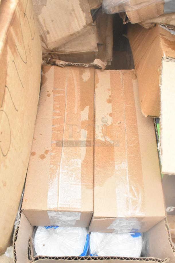 Box of 34 brand new scratch and dent items, including glassware and dishes, in cardboard packaging.