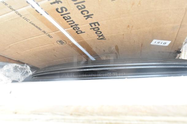 Packaged new black epoxy shelves, scratch and dent condition. Box labeled Lancaster, PA, NSF-certified.