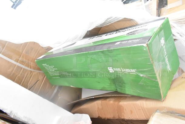 San Jamar EZ-Fit Lid Dispenser box, green with brand logo. New but labeled as scratch and dent. Includes shelving items.