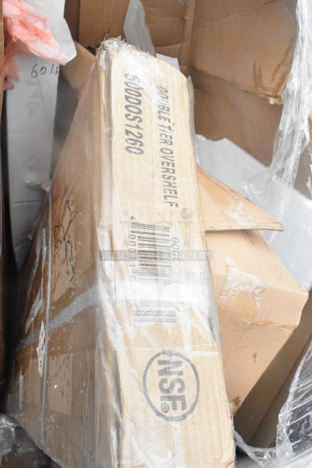 Cardboard box labeled "Double Tier Overshelf, 600DOS1260." NSF logo visible. New, scratch and dent condition. Auction includes 6 items.
