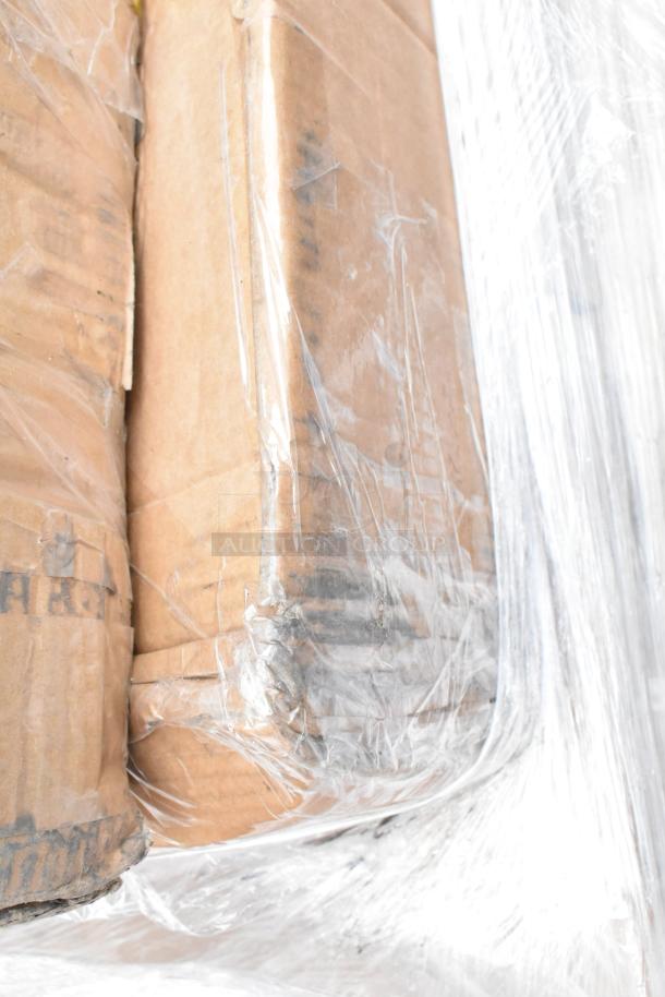 Boxes of 12 new scratch and dent items, including wire shelves and sink, wrapped in plastic.