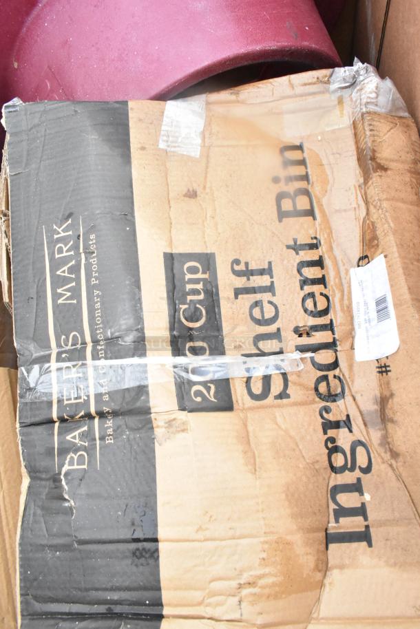 Cardboard box with visible damage labeled "Baker's Mark 200 Cup Shelf Ingredient Bin." Contains new scratch and dent items.