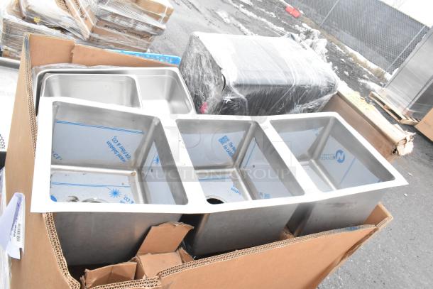 15 brand-new scratch and dent items including stainless steel splash guards and ingredient bins, packaged for auction.