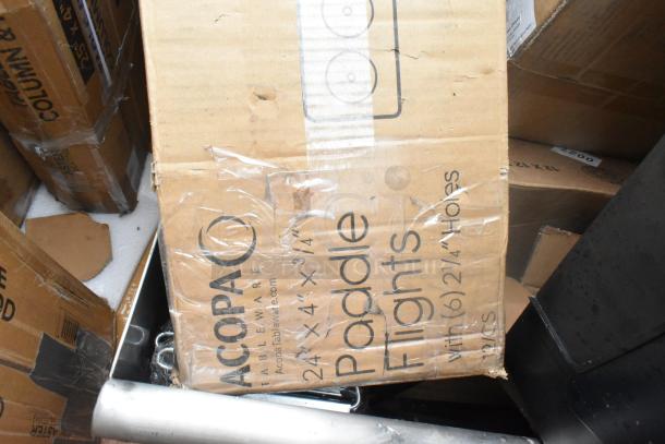 15 new scratch and dent items, including Acopa paddle flights packaging, visible wear, assorted kitchenware.