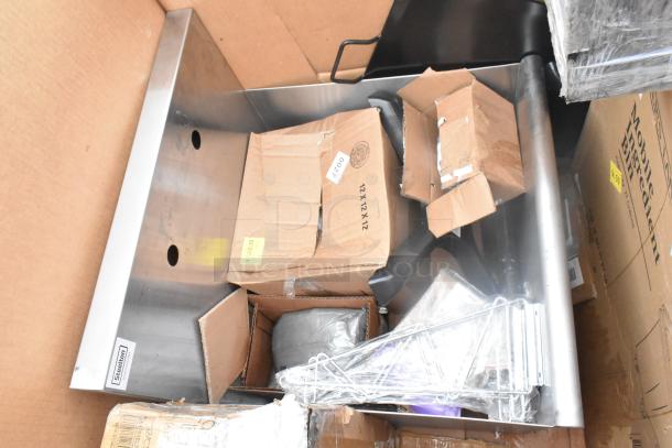 15 brand new scratch and dent items including Steelton splash guard, flight paddle, ingredient bins. Boxes labeled "12x12x12."