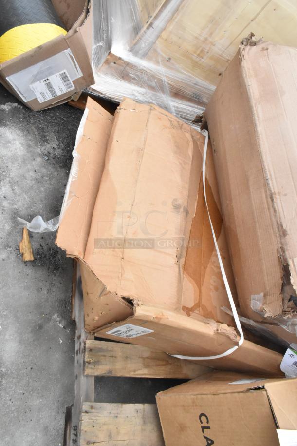 Six new items with visible scratch and dent packaging, including a floor mat and wall shelf. Labels and markings present.