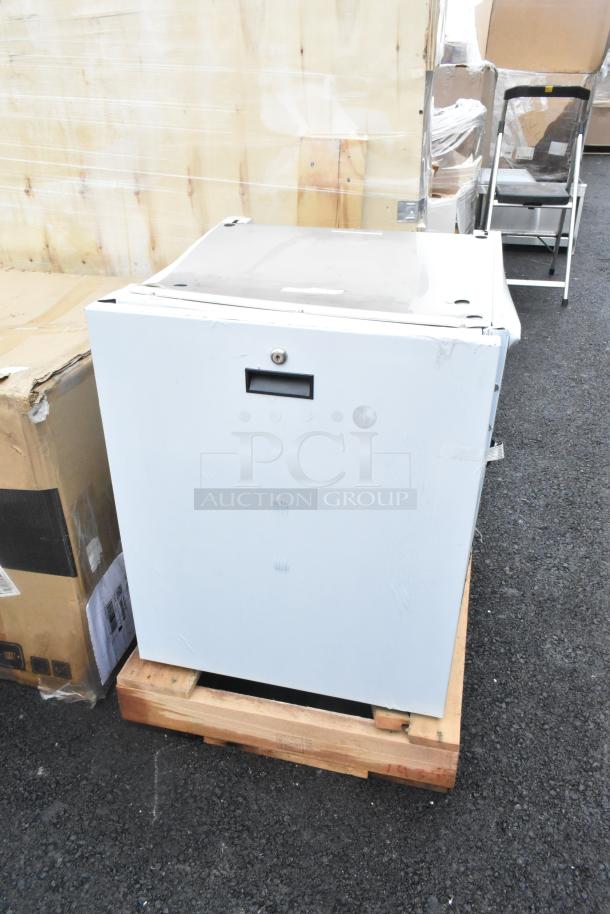 Brand new 2025 Scotsman HST21-A stainless steel ice dispenser stand. Enclosed, some dents visible, dimensions: 21 1/2" x 23 3/4".